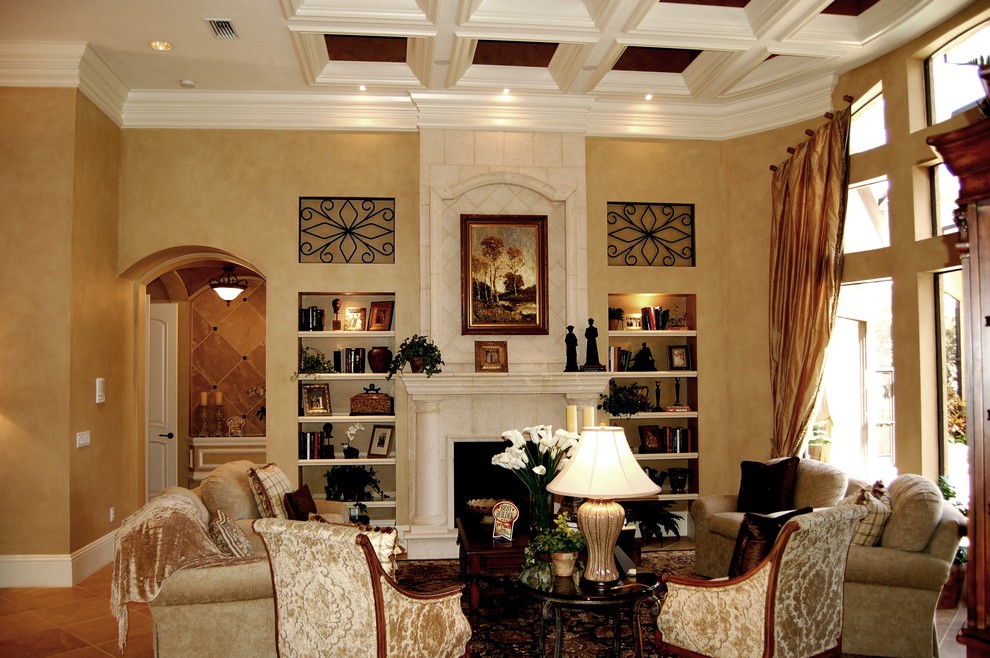 Example of a tuscan living room design in Tampa