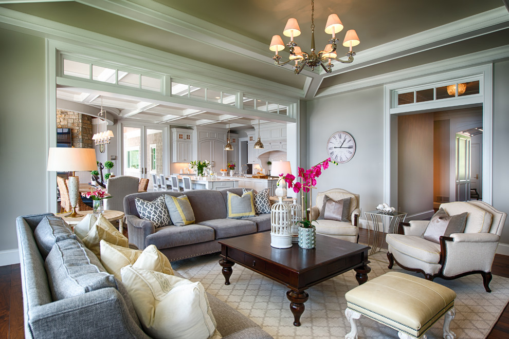 Example of a classic formal and open concept living room design in Minneapolis with gray walls