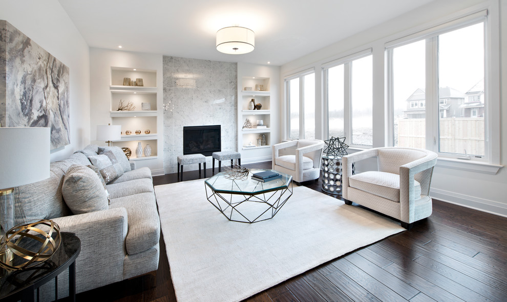 Inspiration for a medium sized contemporary open plan living room in Ottawa with white walls, dark hardwood flooring, a standard fireplace and a tiled fireplace surround.