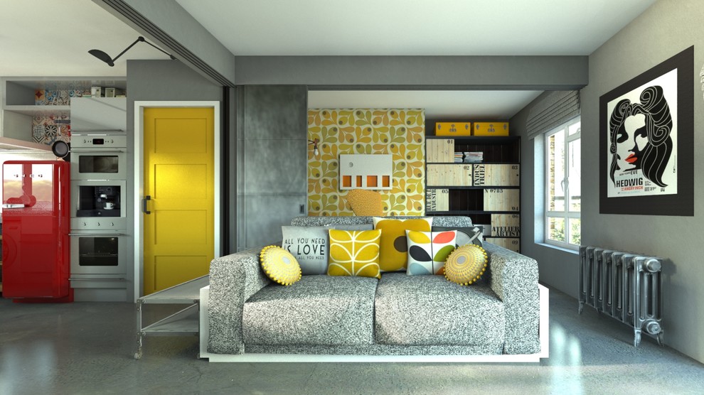 Photo of a small industrial open plan living room in London with grey walls and concrete flooring.