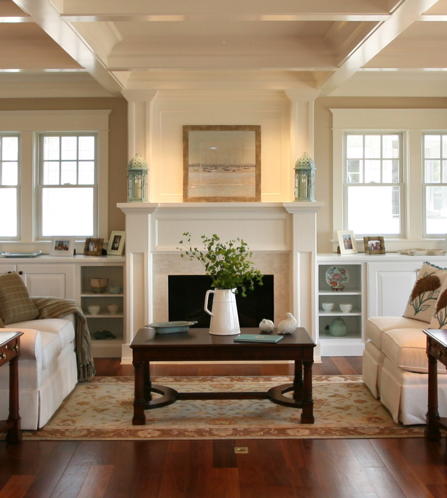 Inspiration for a coastal living room remodel in Philadelphia with beige walls and a standard fireplace