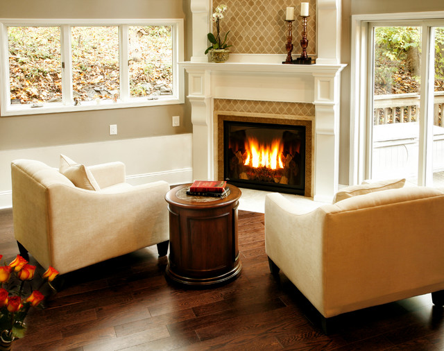 Fireplace in a room with very high ceilings Traditional Living Room