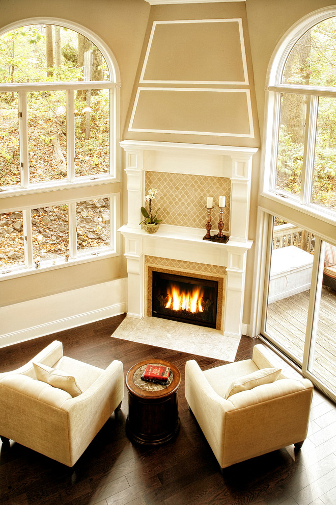 Fireplace in a room with very high ceilings - Traditional - Living Room