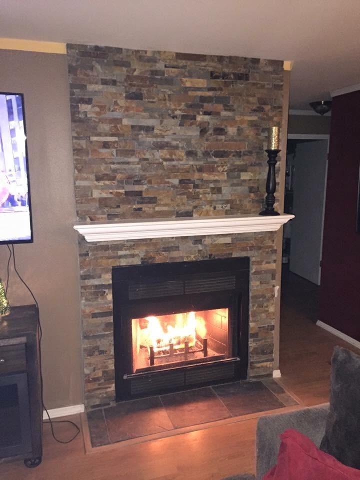 fireplace surronds Modern Living Room Seattle by NW Cutting