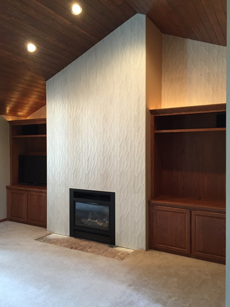 Photo of a medium sized classic living room in Milwaukee with a standard fireplace and a tiled fireplace surround.