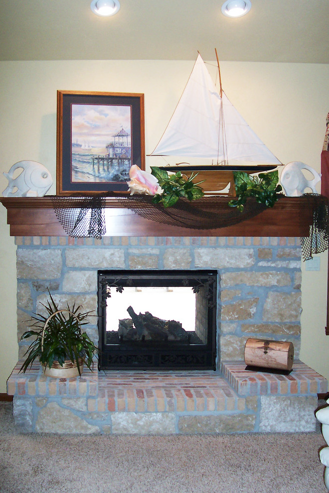 Example of a mid-sized classic enclosed carpeted living room design in Other with beige walls, a standard fireplace and a stone fireplace