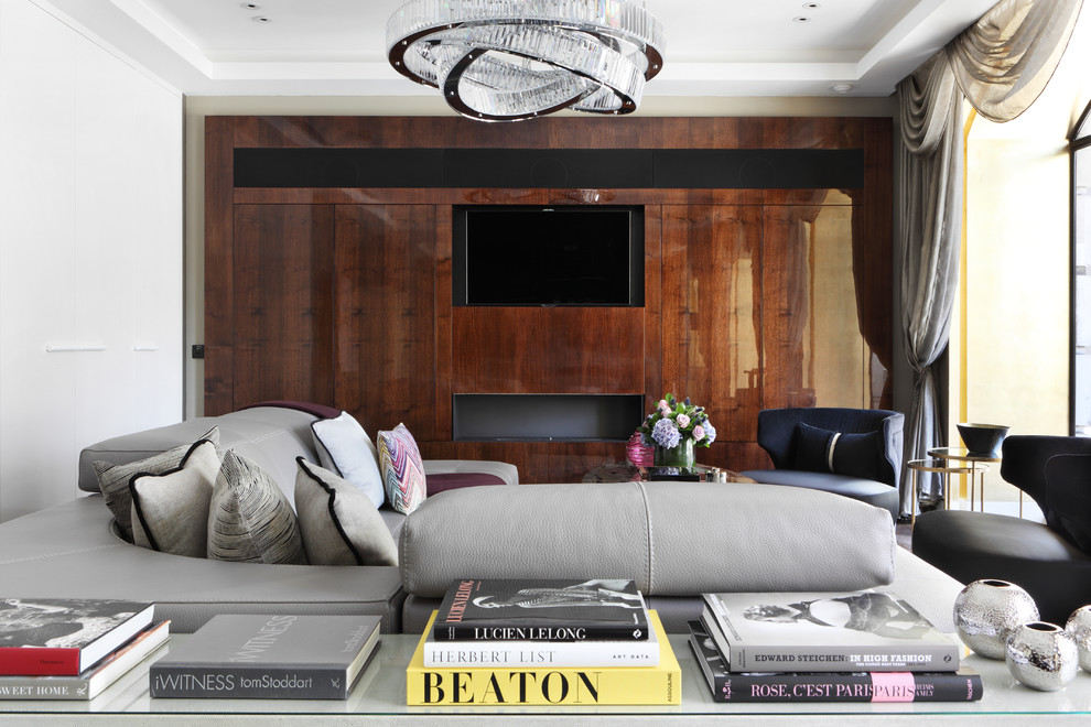 Contemporary living room in London with a built-in media unit.