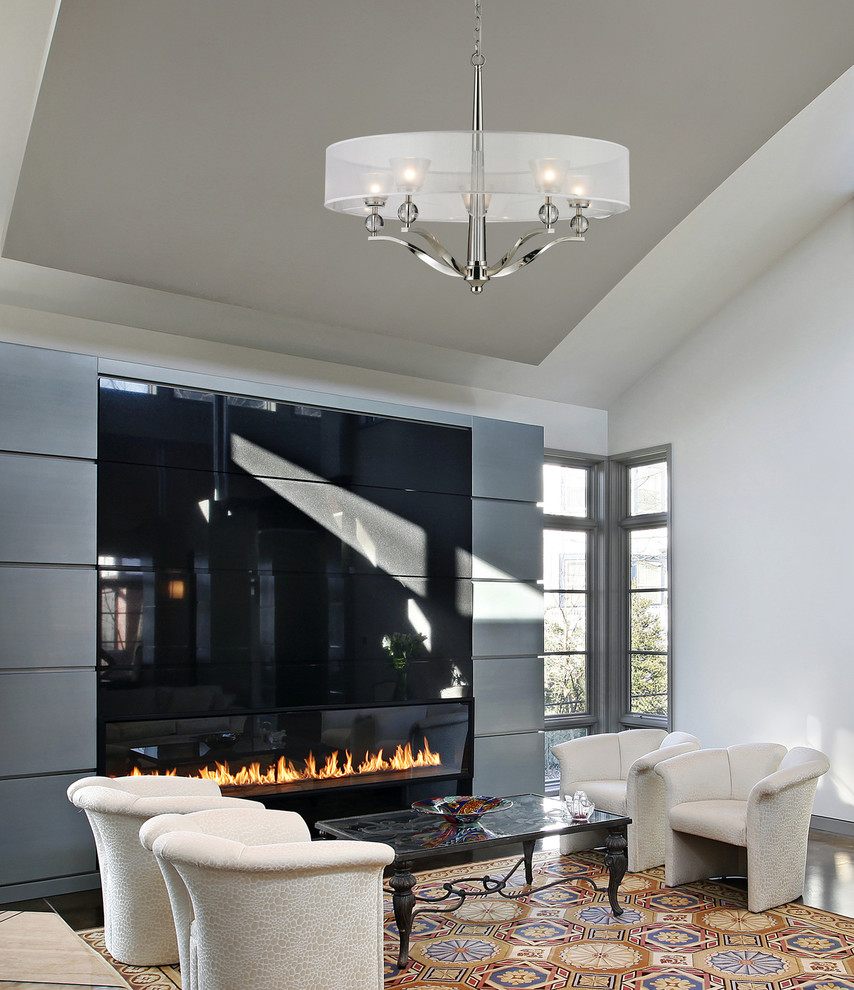 Example of a mid-sized transitional enclosed limestone floor living room design in New York with white walls, a standard fireplace and a metal fireplace