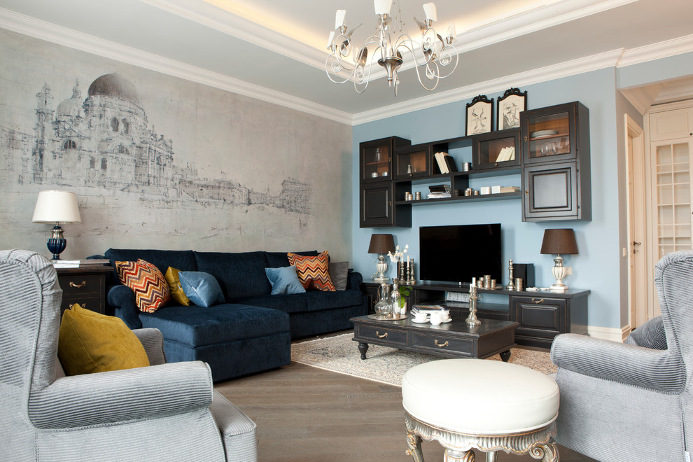 This is an example of a classic enclosed living room in Moscow with blue walls and a freestanding tv.