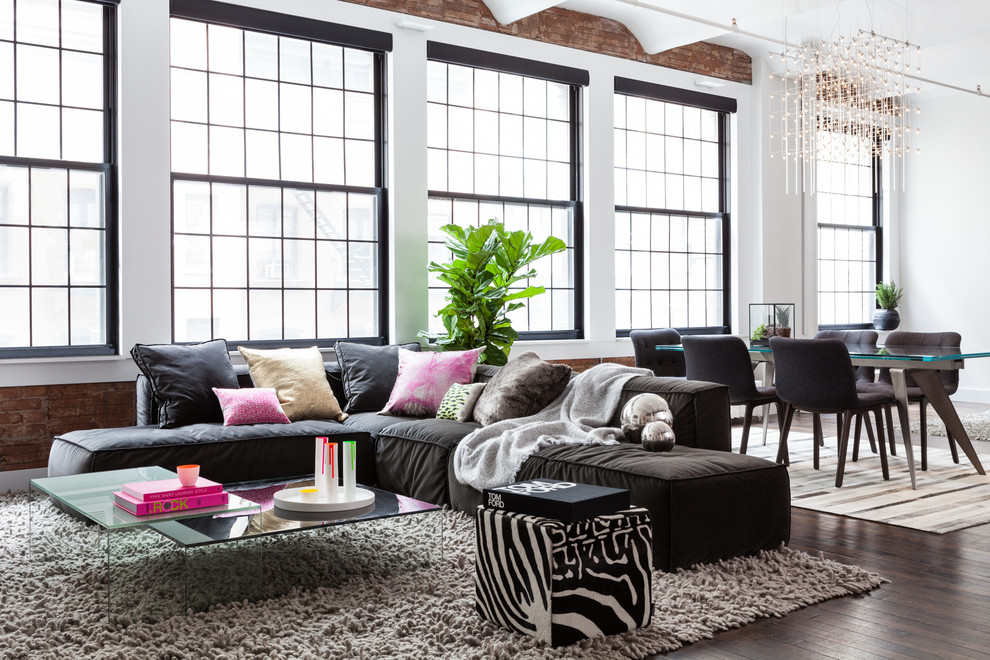 Immagine di un soggiorno contemporaneo aperto con parquet scuro e pavimento marrone