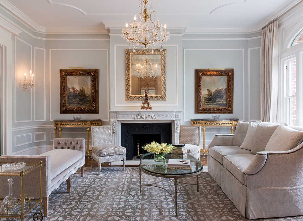 Example of a classic formal and enclosed dark wood floor living room design in DC Metro with a standard fireplace and gray walls