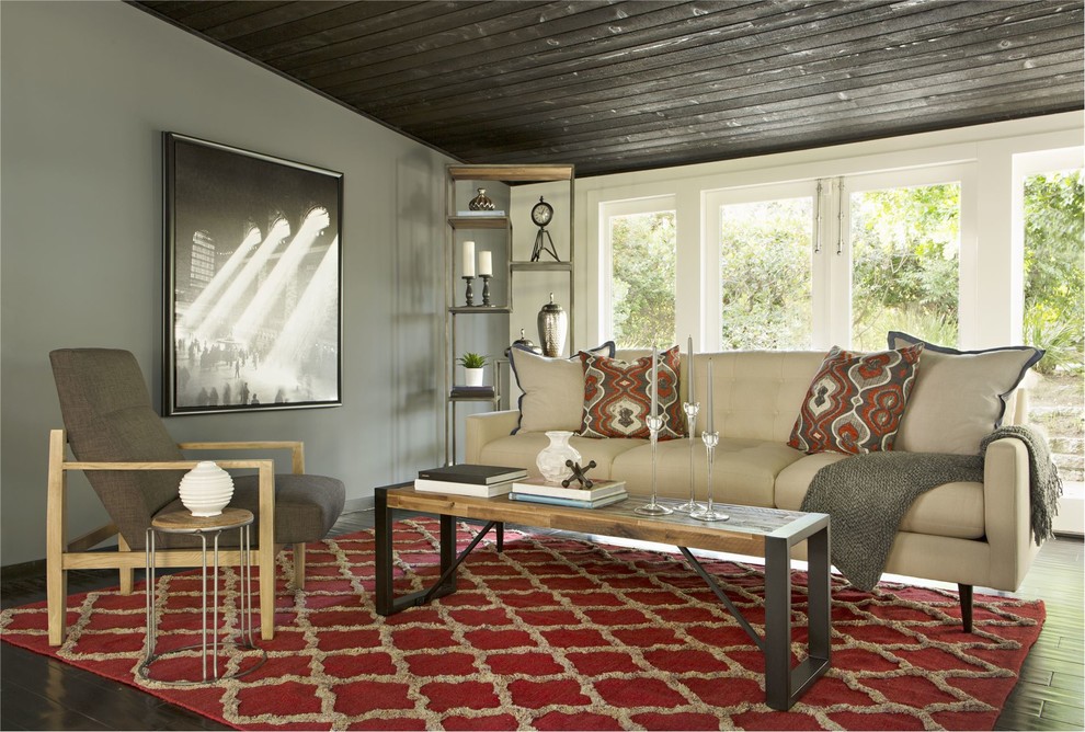 На фото: изолированная гостиная комната среднего размера в стиле ретро с серыми стенами и темным паркетным полом без камина, телевизора