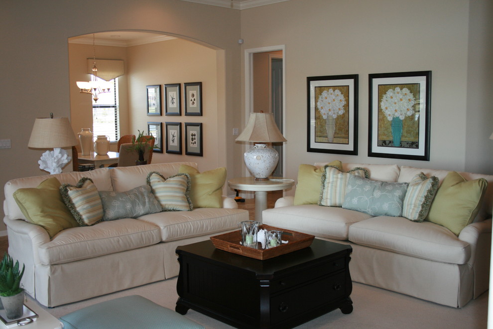 Beach style living room photo in Grand Rapids with beige walls