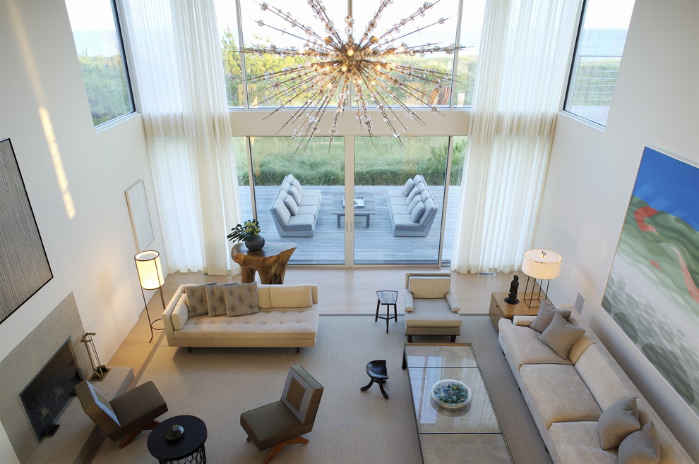 Huge minimalist living room photo in New York