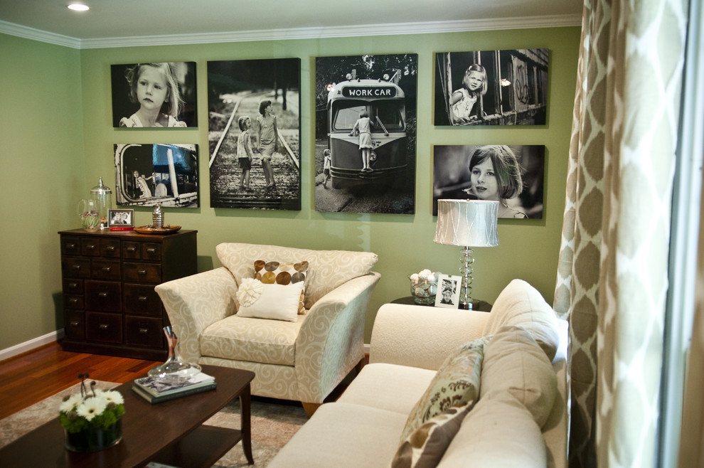 Classic living room in Baltimore with green walls.