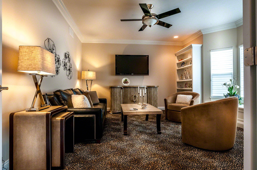 Example of a large trendy open concept carpeted living room design in Cleveland with beige walls and a wall-mounted tv
