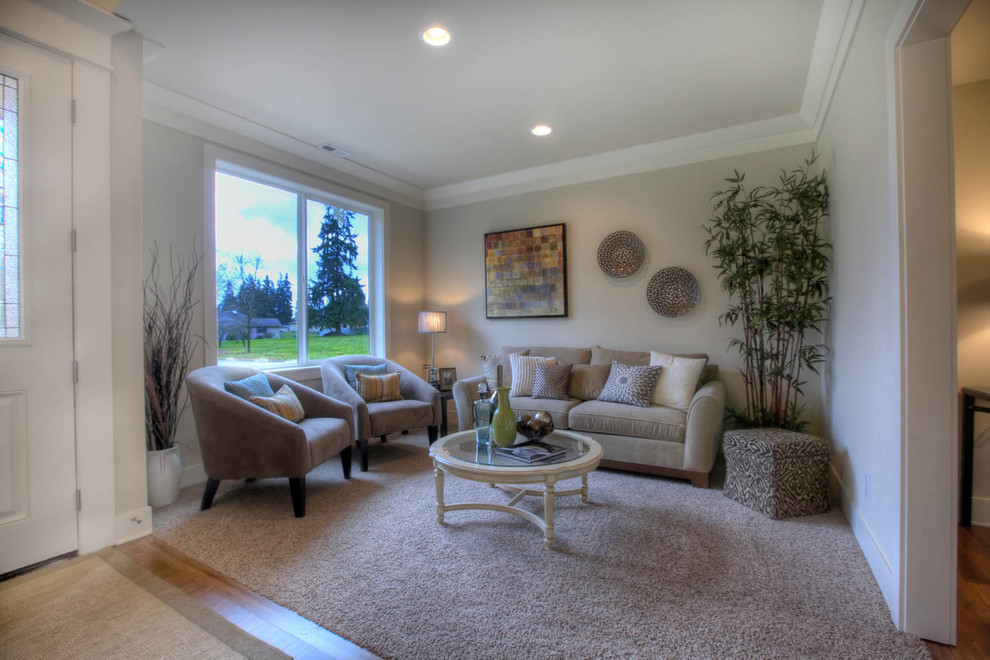 Photo of a medium sized contemporary formal open plan living room in Seattle with beige walls and carpet.