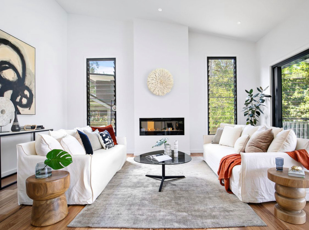 Beach style living room photo in Sydney