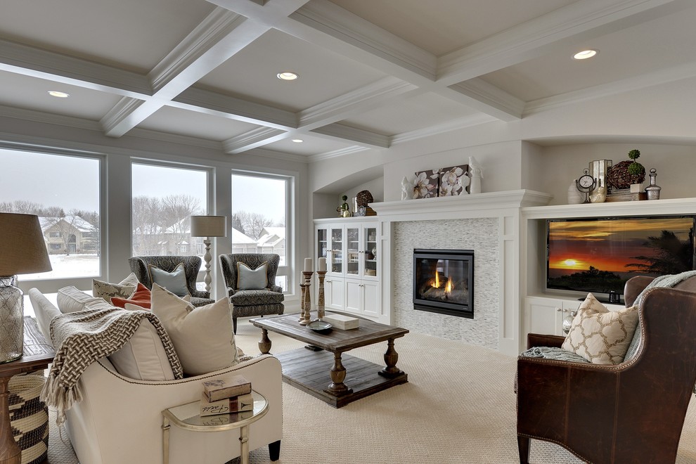 Inspiration for a large formal and open concept carpeted living room remodel in Minneapolis with white walls, a standard fireplace, a tile fireplace and a media wall