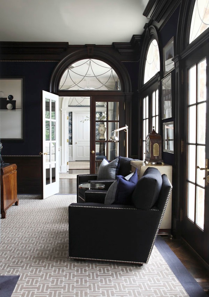Foto di un soggiorno classico chiuso con pareti blu e moquette