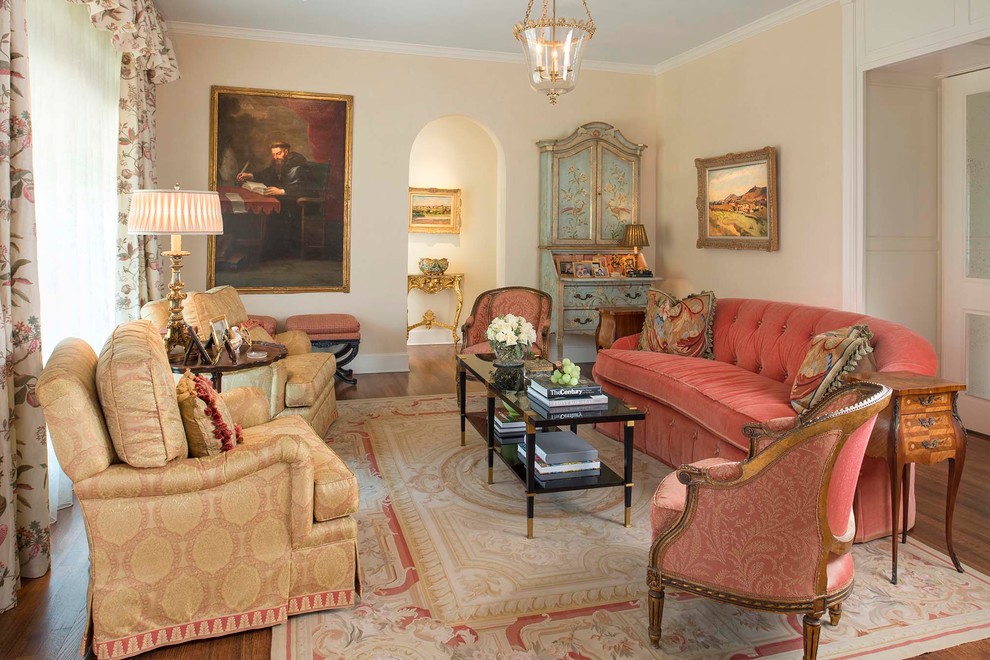 Inspiration for a victorian formal and enclosed medium tone wood floor living room remodel in Dallas with beige walls, no fireplace and no tv