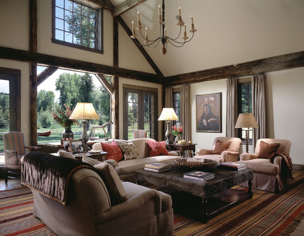 This is an example of a large rustic living room in Other with beige walls and no tv.