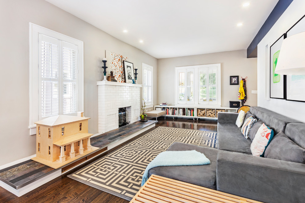 Свежая идея для дизайна: гостиная комната в современном стиле с серыми стенами - отличное фото интерьера
