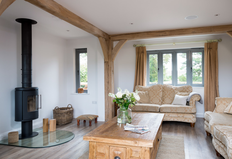Design ideas for a farmhouse living room in West Midlands.