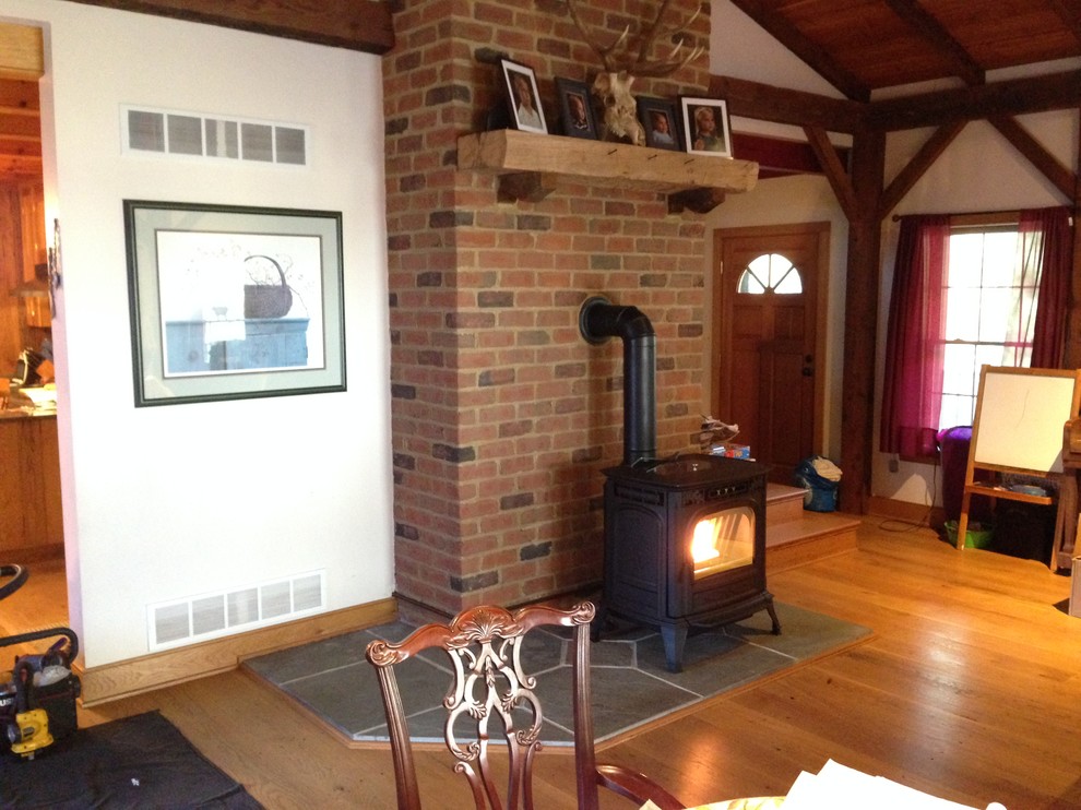 Living Room With Pellet Stove And Tv