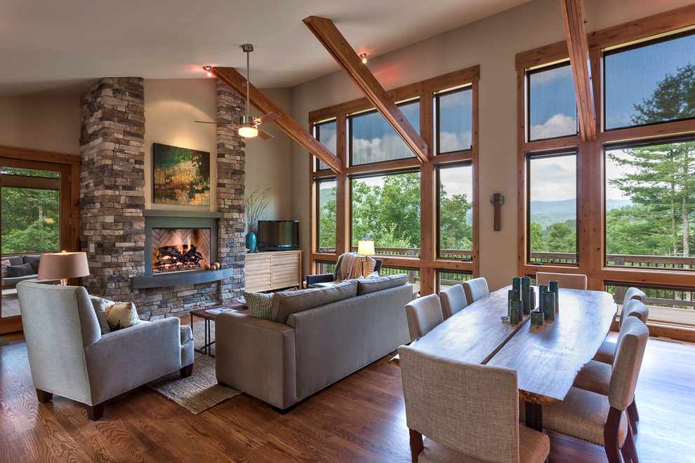 Living room - transitional living room idea in Other with a stone fireplace