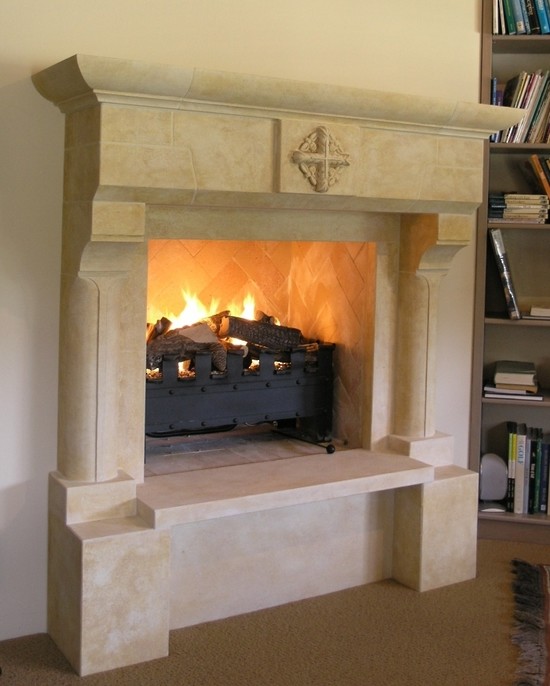 French 'Gothique' fireplace mantle carved in Oamaru Limestone with aged