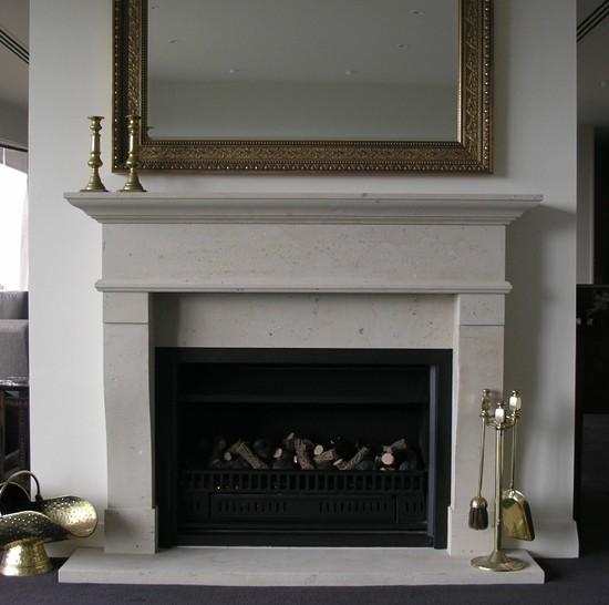 French Provincial inspired fire surround carved in Hinuera Stone Farmhouse Living Room