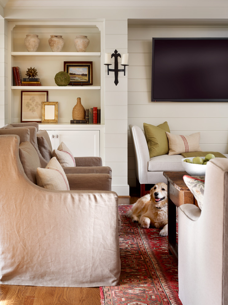 Идея дизайна: изолированная, парадная гостиная комната среднего размера в классическом стиле с телевизором на стене, белыми стенами, паркетным полом среднего тона и коричневым полом без камина