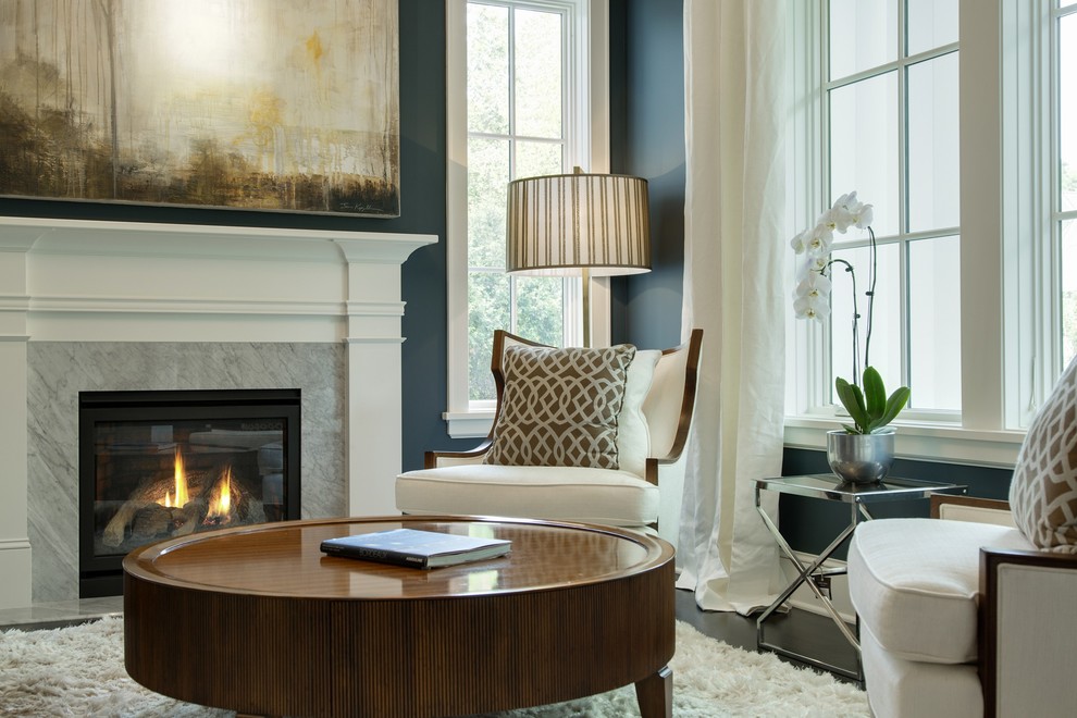 Inspiration for a transitional formal dark wood floor living room remodel in Minneapolis with blue walls, a standard fireplace and no tv