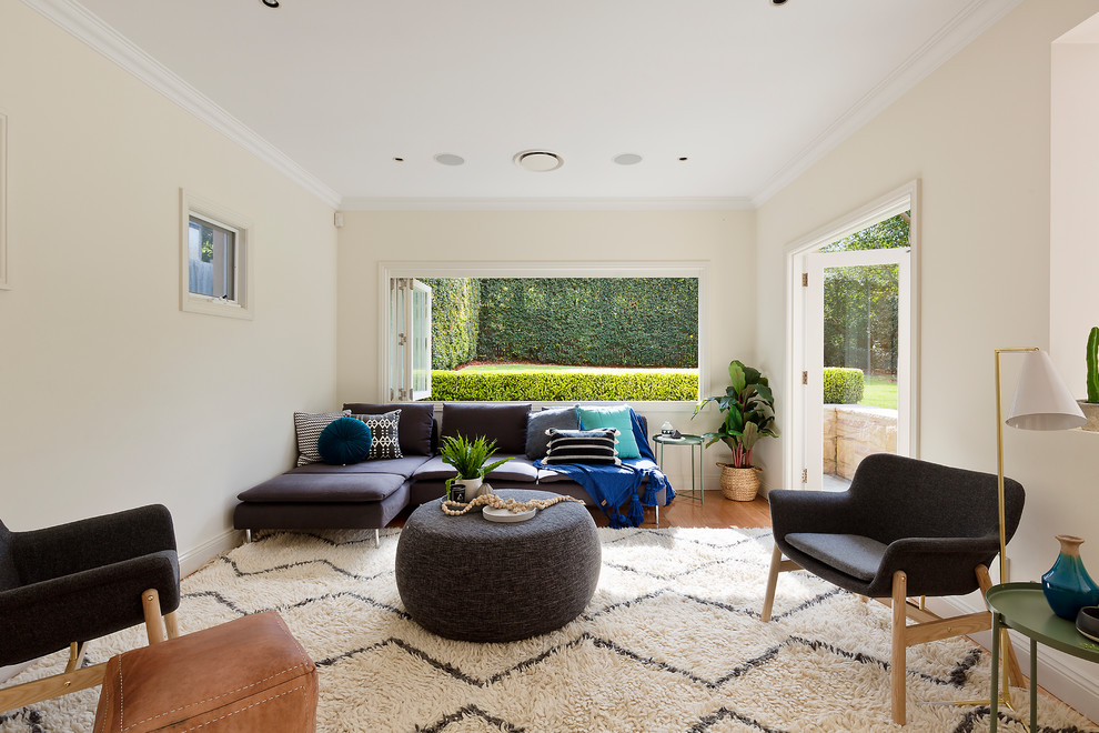 Design ideas for a large modern open plan living room in Sydney.