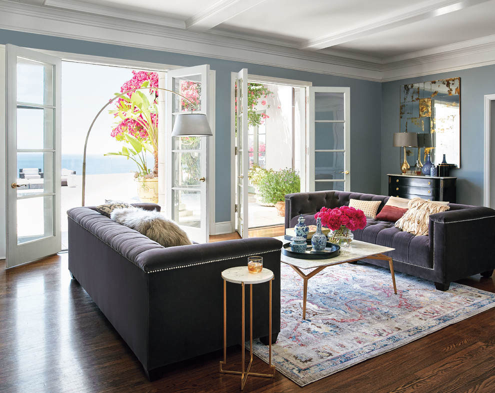 Inspiration för ett vintage separat vardagsrum, med ett finrum, blå väggar, mörkt trägolv och brunt golv