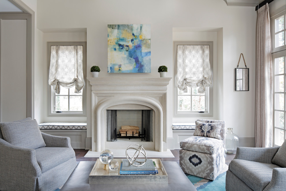 Photo of a classic formal living room curtain in Atlanta with white walls and a standard fireplace.