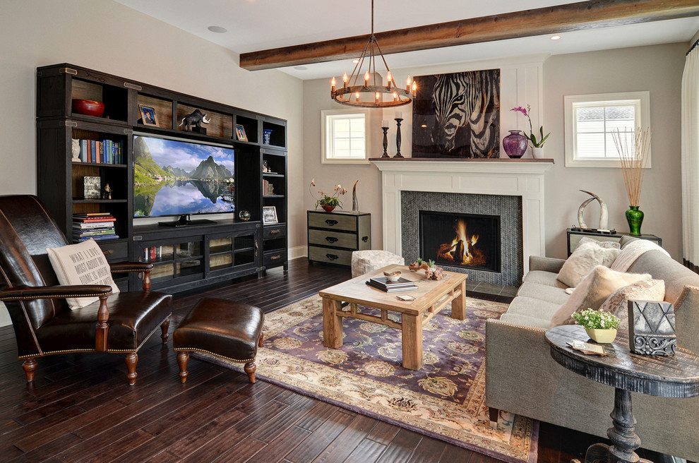 Photo of a classic open plan living room in Chicago with grey walls, dark hardwood flooring, a standard fireplace and a built-in media unit.