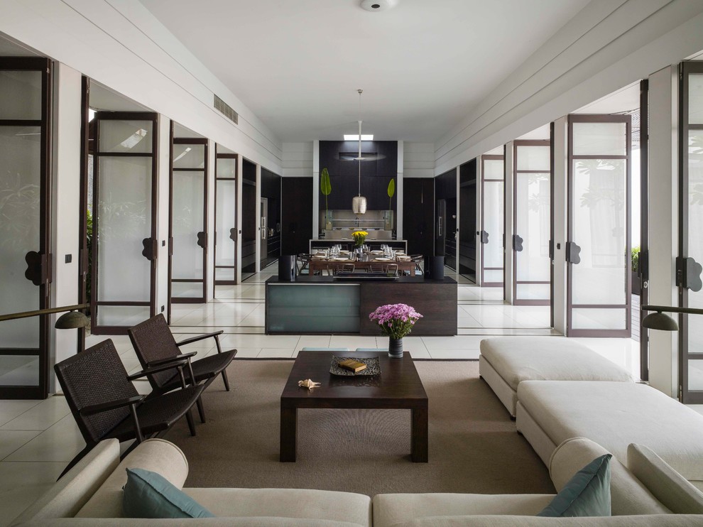 Immagine di un soggiorno minimal aperto con sala formale, pareti bianche e pavimento in marmo