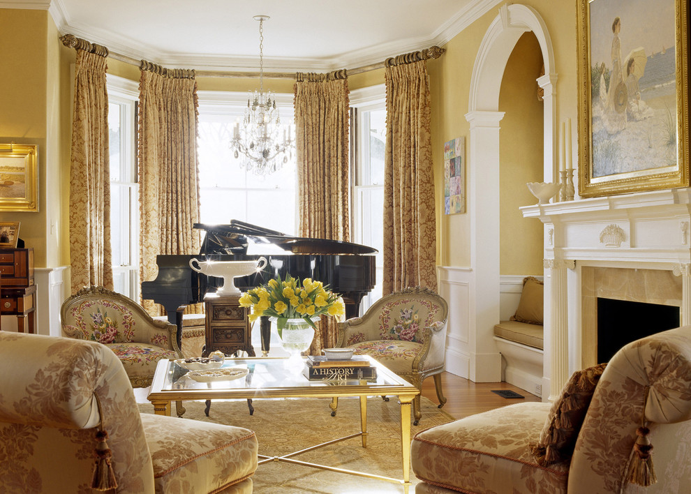 Example of an ornate living room design in Boston with a music area and yellow walls