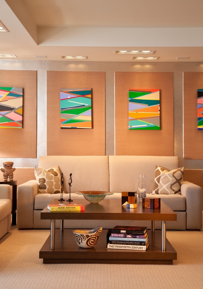 Inspiration for a contemporary living room remodel in Miami with beige walls