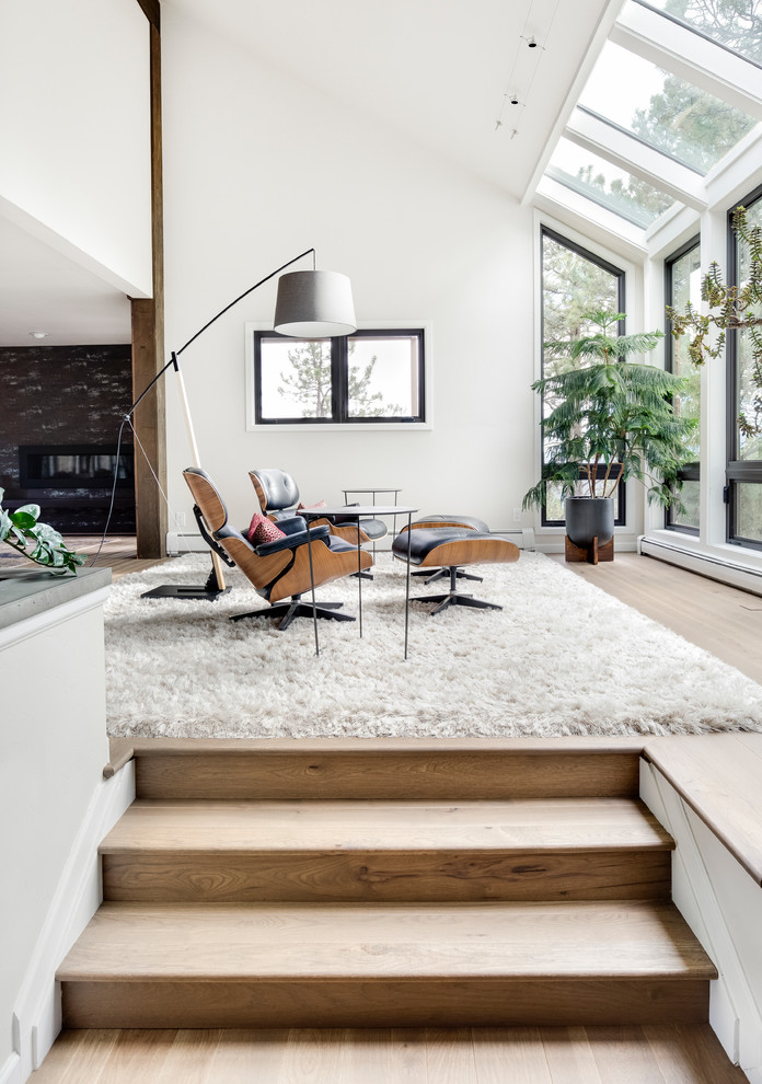 Trendy formal and open concept medium tone wood floor and beige floor living room photo in Phoenix with white walls