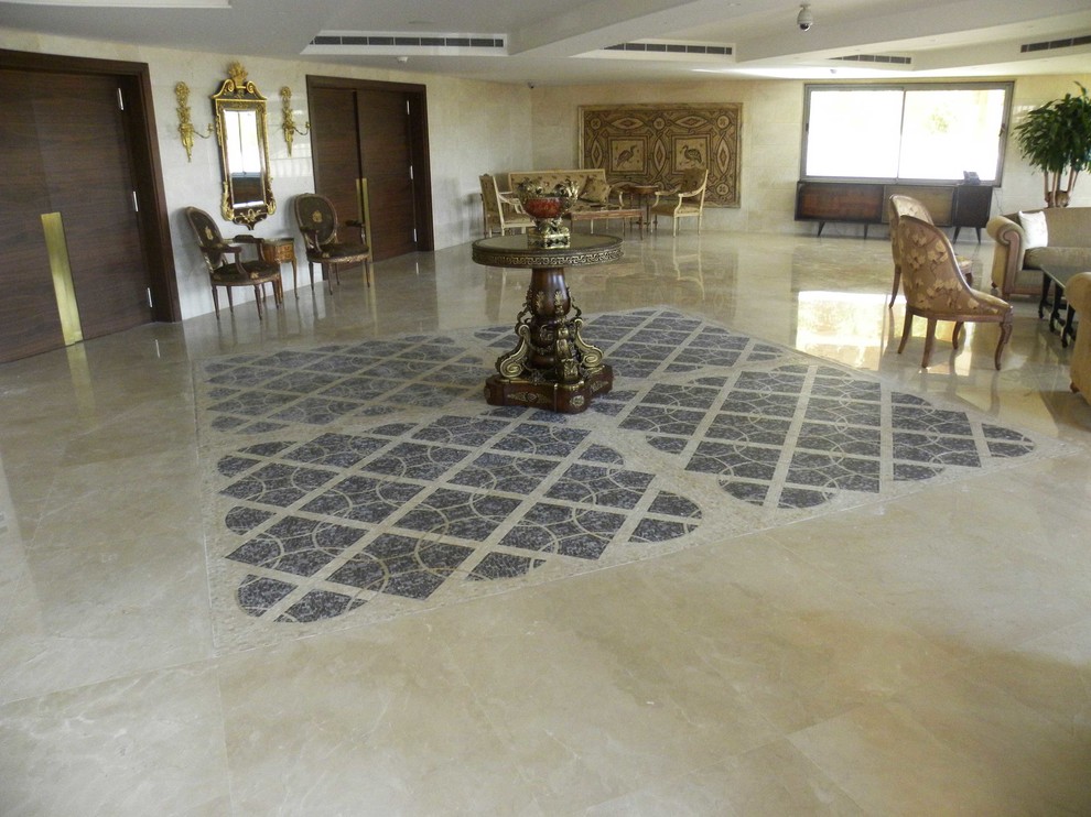 Immagine di un soggiorno contemporaneo con pavimento in marmo e pavimento multicolore