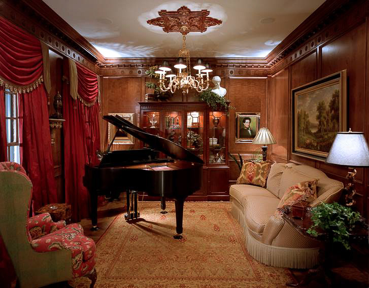 Inspiration for a large victorian enclosed living room in Charlotte with a music area, brown walls, dark hardwood flooring, no fireplace, no tv and brown floors.