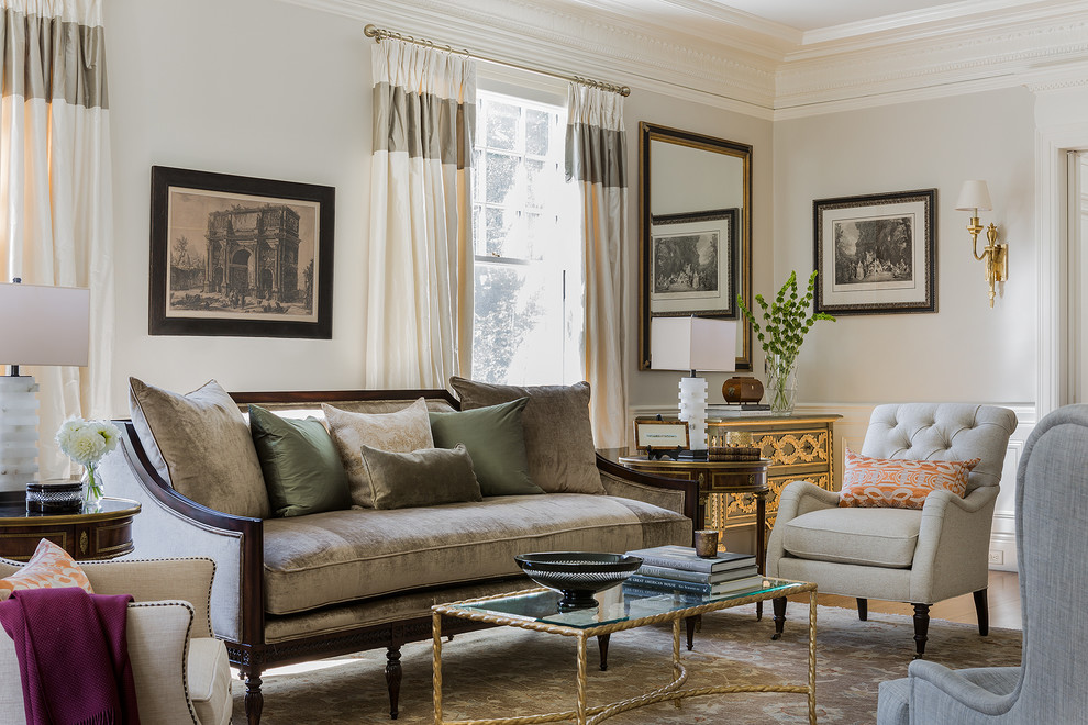 Inspiration for a timeless formal medium tone wood floor living room remodel in Boston with beige walls