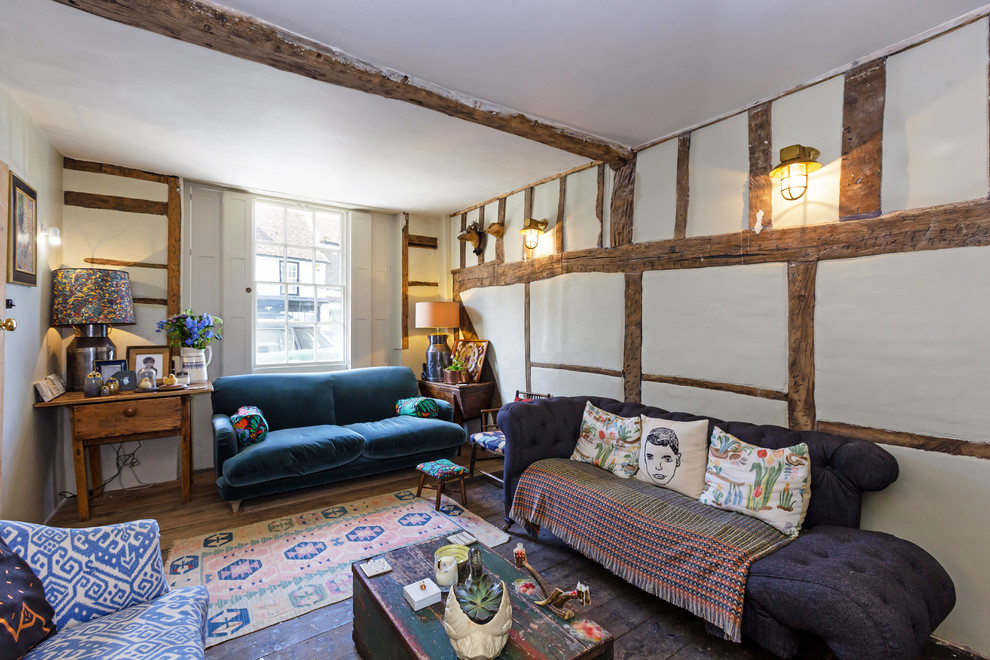 This is an example of a medium sized rustic living room in Oxfordshire with white walls.