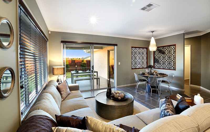 Ispirazione per un soggiorno design di medie dimensioni con pareti grigie e pavimento con piastrelle in ceramica
