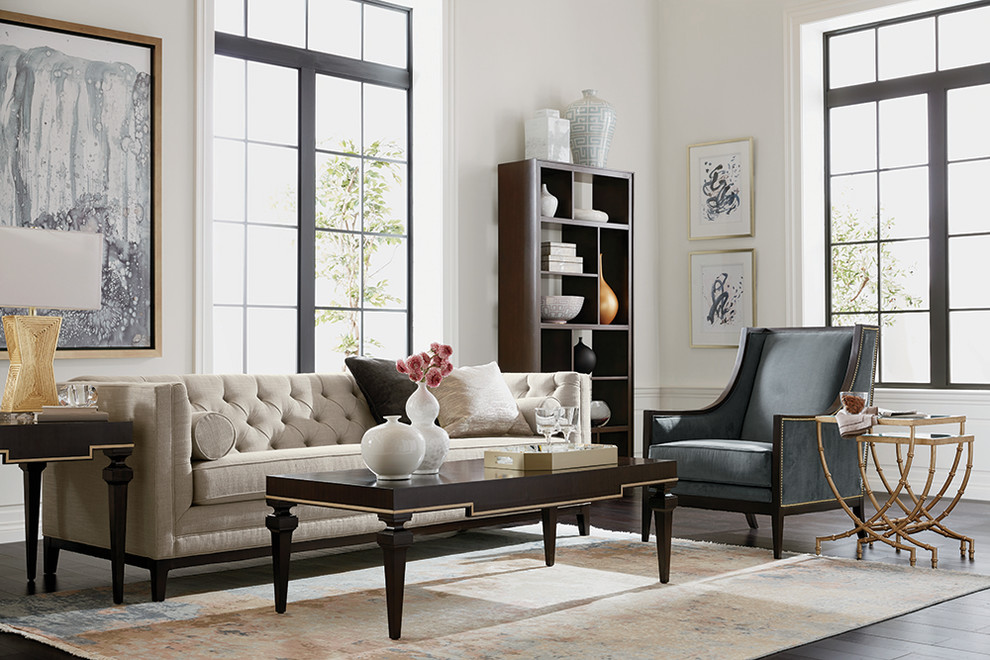 Example of a mid-sized trendy formal and enclosed dark wood floor and brown floor living room design in Sacramento with white walls, no fireplace and no tv