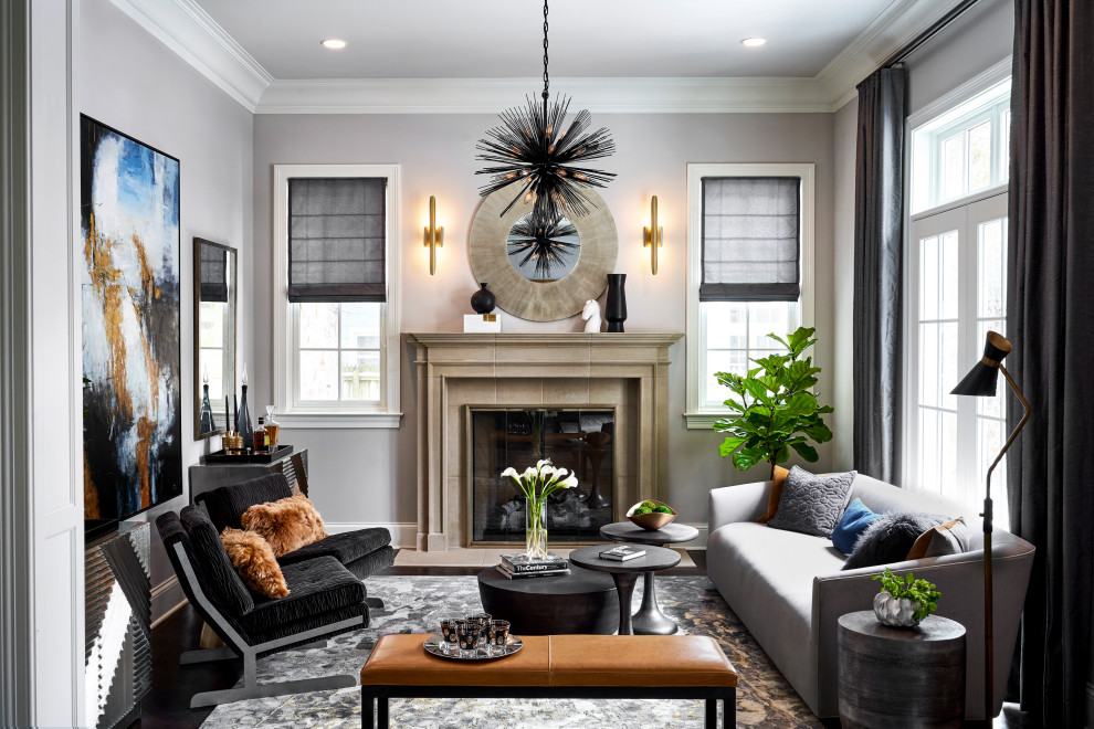 Inspiration for a small transitional open concept dark wood floor and brown floor living room remodel in Chicago with gray walls, a standard fireplace and a stone fireplace