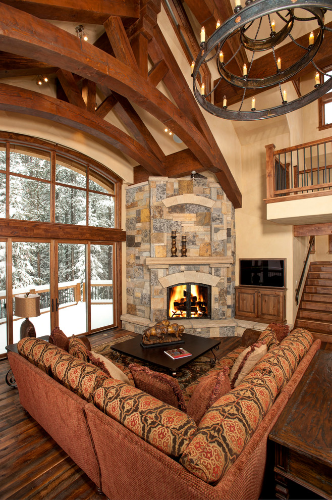 Inspiration for a contemporary living room in Denver with a corner fireplace.